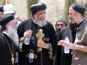 Jordanian Prince Ghazi Bin Mohamed and Pope Tawadros II, the head of Egypt's Coptic Orthodox Church, visit Bethany beyond the Jordan river. (AFP/Khalil Mazraawi)