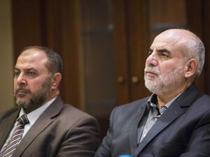Zaki Bani Irsheid (L), former deputy of the Islamic Action Front, and Mohammad Zyoud, party chief of the Islamic Action Front, speaks during a meeting in Amman, Jordan. (Lindsey Leger)