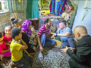 Jordan's King Abdullah II pays surprise visits to underprivileged families in Deir Alla District. (Royal Hashemite Court)