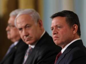 King Abdullah II and Israeli PM Benjamin Netanyahu listen to remarks on September 1, 2010 in Washington, DC. (AFP/ File Photo)