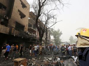 The aftermath of the July 3 Daesh attack on a shopping center in Baghdad (AFP/Sabah Arar)