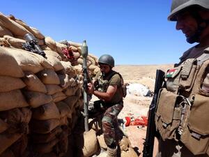 Kurdish peshmerga fighters outside of Sinjar, Iraq in August, 2015. (AFP/Safin Hamed)