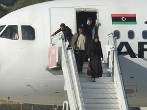 A picture taken on December 23, 2016 shows a group of hostages being released in Valletta, Malta, from the Afriqiyah Airways A320 after it was hijacked from Libya. (AFP/Matthew Mirabelli)