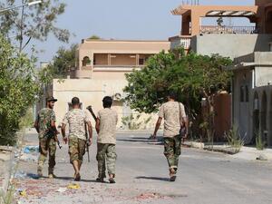 Fighters from the pro-government forces loyal to Libya's Government of National Unity (GNA) walk on August 3, 2016 in Sirte during an operation against Daesh. (AFP/Mahmud Turkia) Fighters from the pro-government forces loyal to Libya's Government of National Unity (GNA) walk on August 3, 2016 in Sirte during an operation against Daesh. (AFP/Mahmud Turkia)