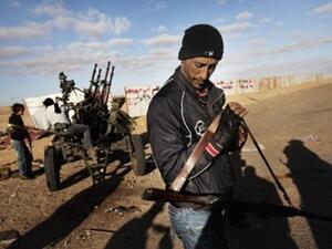 كر وفر بين المحتجين وقوات القذافي