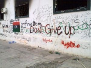 شعارات مناهضة للقذافي على الجدران/أ.ف.ب