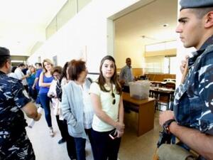 Lebanese guards watch over the line for a polling station on May 8, 2016. (AFP/File) Lebanese guards watch over the line for a polling station on May 8, 2016. (AFP/File)