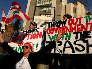 Lebanese women protest the trash crisis in Beirut. (AFP/Patrick Baz)