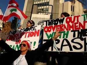 Lebanese women protest the trash crisis in Beirut. (AFP/Patrick Baz)