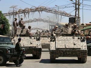 Lebanese forces on patrol in a northern border village following a militant attack. (AFP/File)