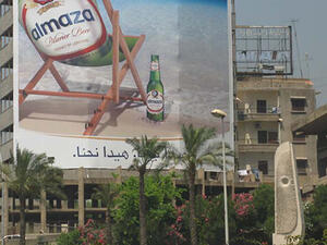 Billboard of Lebanese beer Almaza, an ad that is banned in Lebanon's Tripoli. (File photo)