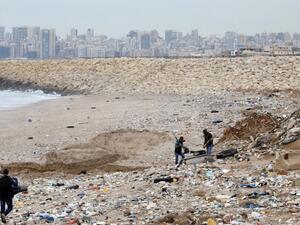 Hunters shoot down seagulls that are attracted by the garbage at the Costa Brava dump, on January 14, 2017 near Beirut's International Airport. (AFP/Anwar Amro)