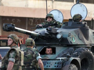 A Lebanese army vehicle patrol the northern city of Tripoli on April 2, 2014. (AFP/Ibrahim Chalhoub)