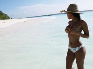 Leigh-Anne Pinnock goes topless on the beach (Image: leighannepinnock/ Instagram)