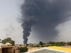 Smoke billows from a fire at a Libya oil depot in 2014. (AFP/File)