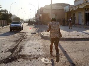 A member of the forces loyal to Libya's UN-backed Government of National Accord (GNA) runs on a street on August 21, 2016 in the coastal city of Sirte, east of the capital Tripoli. (AFP/Mahmud Turkia) A member of the forces loyal to Libya's UN-backed Government of National Accord (GNA) runs on a street on August 21, 2016 in the coastal city of Sirte, east of the capital Tripoli. (AFP/Mahmud Turkia)