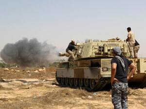 Forces loyal to Libya's UN-backed unity government fire from a tank in Sirte's centre towards Ouagadougou as they advance to recapture the city from Daesh on June 10, 2016. (AFP/Mahmud Turkia) Forces loyal to Libya's UN-backed unity government fire from a tank in Sirte's centre towards Ouagadougou as they advance to recapture the city from Daesh on June 10, 2016. (AFP/Mahmud Turkia)