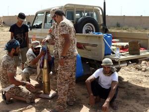 Fighters from forces loyal to Libya's Unity Government gather next to a pick up truck on July 2, 2016 as they take position to hit Daesh targets in Sirte during an operation to recapture the coastal city. (AFP/Mahmud Turkia) Fighters from forces loyal to Libya's Unity Government gather next to a pick up truck on July 2, 2016 as they take position to hit Daesh targets in Sirte during an operation to recapture the coastal city. (AFP/Mahmud Turkia)