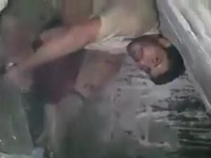 Suleiman al Huti's last moments were captured on film by the militants who killed him (screenshot)