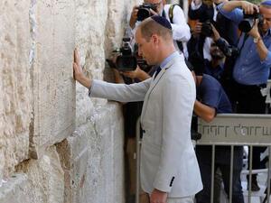 Britain's Prince William on the Western Wall, the holiest site where Jews can pray, in Jerusalem's Old City during his five-day visit to the region in which he visited Jordan, Israel and the Occupied West Bank. (AFP/ File)