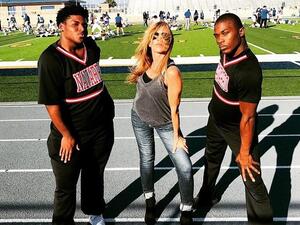 Before graduating, LaDarius earned a cheer scholarship to Navarro, a junior college in Texas. He is pictured here with a teammate and his coach  (Instagram)