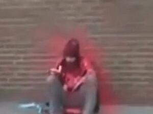 Homeless Man Sprayed with Red Paint (Facebook)