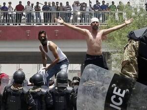 An image shared by social media users for confrontations in Basra city between protesters and police. (Twitter)