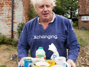 A screenshot taken from the video when Boris Johnson appeared holding tea for journalists outside his home.