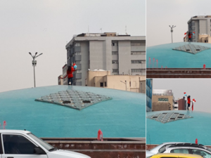 Iranian woman stood up and protested the compulsory laws in Enqelab Square in Tehran. (Socialmedia)