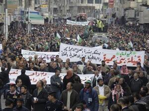 Jordanian Muslim Brotherhood members protest against the government in Amman. (AFP/File) Jordanian Muslim Brotherhood members protest against the government in Amman. (AFP/File)