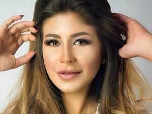 ملك قورة بطلة فيلم (اطلعولي برة) 