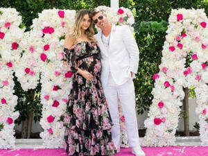 The couple shared photos from their baby shower, which took place on January 20, which showed a wall of flowers spelling out 'MIA' (Source: aprillovegeary - Instagram)