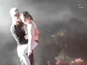 A video on social media alleging that a young girl jumped on stage and leapt into the arms of Spanish singer, Enrique Iglesias. (Screenshot)