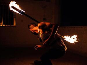 In this undated photo, a performer practises his craft at a fire jam (Photo courtesy of Anas Nahleh)