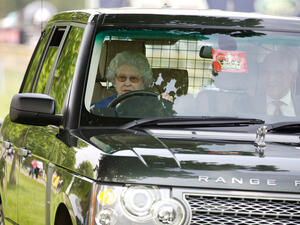 Elizabeth II driving her car. (Shutterstock/ File Photo)