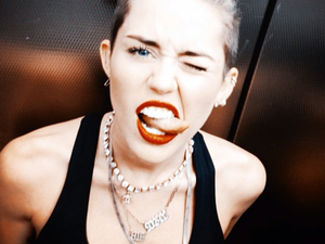 Miley Cyrus gettin' glitzed for VMA debacle of a show that bumped Assad smack dab down to #2 (Image: Facebook)