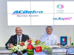 Mohammed Al Fayyad, Director of Customer Care and Aftersales, General Motors Africa and Middle East, and Zaid Alqufaidi, Managing Director, ENOC Retail