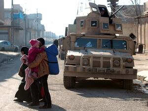 Displaced Iraqi Family in Mosul City. (AFP)