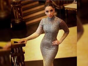 صمم الفستان خصيصاً لها بأنامل المصمم الفلبيني المقيم في دبي MICHAEL CINCO