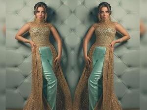 بلقيس فتحي ترتدي الجمبسوت وتبدو بمنتهى الأناقة