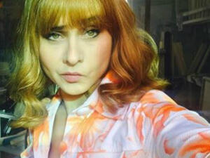 Nelly sported short blond hear and thick bangs which made her look much younger (Source: Nelly Karim -
 Instagram)