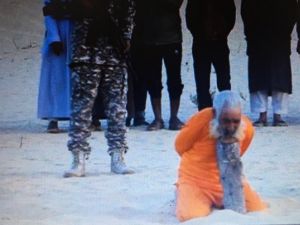 A screengrab allegedly shows the militants standing behind Abu Haraz. (File photo)