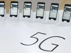 Mobile phones with 5G are displayed at the Mobile World Congress in Barcelona on February 22, 2016. (AFP/File)