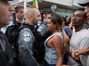 Ethiopian Israeli protestors scuffle with Israeli police during a demonstration against police brutality and racism. (AFP/File)