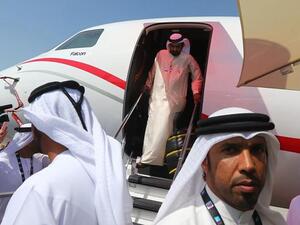 Sheikh Mohammad Bin Rashed Al Maktoum, prime minister of the United Arab Emirates and ruler of Dubai, goes out from a private jet after he toured the Dubai Airshow on Sunday (AFP/File)