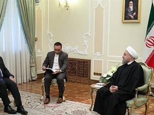 Iran’s President Hassan Rouhani (R) meets with visiting Turkish Foreign Minister Mevlut Cavusoglu in Tehran, November 26, 2016. (AFP/File)