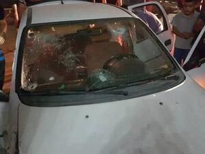 Palestinians inspect a car with bullet marks on its windshield at the Shu’fat refugee camp, north of Jerusalem al-Quds, early on September 5, 2016. (File photo)