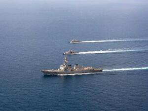A file image released by the US Navy shows a guided-missile destroyer USS Mason (DDG 87) conducting formation exercises with the Cyclone-class patrol crafts USS Tempest (PC 2) and USS Squall (PC 7) on September 10, 2016. (AFP/Navy Visual News Service)