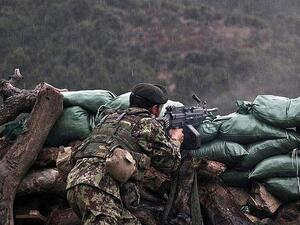 An Afghan soldiers takes aim. (Twitter)