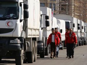 Aid convoys in Syria. (AFP/Louai Beshara)
